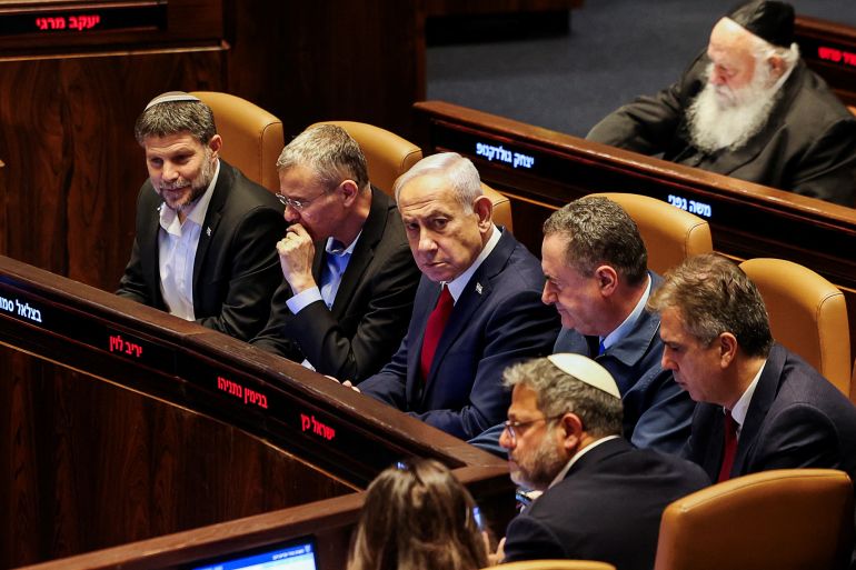 هذا ما تخفيه إسرائيل خلف السماح بدخول المساعدات 1 Israeli Prime Minister Benjamin Netanyahu, Finance Minister Bezalel Smotrich, Defense Minister Israel Katz and National Security Minister Itamar Ben-Gvir attend a discussion at the plenum in the Knesset, Israel's parliament, in Jerusalem, July 23, 2025. REUTERS/Ronen Zvulun