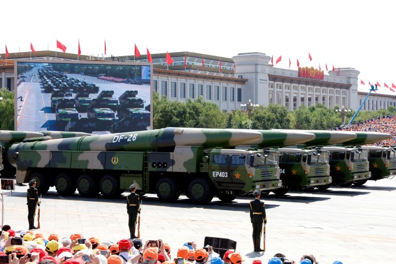 ما سر عدم استخدام الصين لسلاح الجو؟ 2 الصاروخ الصيني "دونغ فينغ -26" Military vehicles carry DF-26 medium-range ballistic missiles during a parade commemorating the 70th anniversary of Japan's surrender during World War II held in front of Tiananmen Gate in Beijing, Thursday, Sept. 3, 2015. The spectacle involved more than 12,000 troops, 500 pieces of military hardware and 200 aircraft of various types, representing what military officials say is the Chinese military's most cutting-edge technology. (AP Photo/Ng Han Guan)