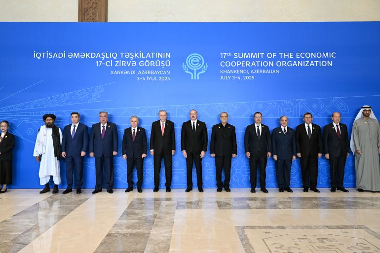 محللون يشرحون أهداف وتوقيت زيارة بزشكيان إلى أذربيجان 1 KHANKENDI, AZERBAIJAN - JULY 4: (----EDITORIAL USE ONLY - MANDATORY CREDIT - 'TURKISH PRESIDENCY / HANDOUT' - NO MARKETING NO ADVERTISING CAMPAIGNS - DISTRIBUTED AS A SERVICE TO CLIENTS----) Turkish President Recep Tayyip Erdogan, Azerbaijan President Ilham Aliyev, President of Iran Masoud Pezeshkian, President of Uzbekistan Shevket Mirziyoyev, President of Kyrgyzstan Sadyr Japarov, President of Kyrgyzstan Imamali Rahman, Prime Minister of Pakistan Shahbaz Sharif, President of TRNC Ersin Tatar, Minister of Industry and Advanced Technology of the United Arab Emirates (UAE) Sultan al-Jabir, Prime Minister of Kazakhstan Oljas Bektenov, Deputy Prime Minister of the interim government of Afghanistan Mullah Abdulgani Birader and Deputy Prime Minister and Foreign Minister of Turkmenistan Rashid Meredov as they attend the 17th Summit of the Economic Cooperation Organization in Khankendi, Azerbaijan on July 4, 2025. (Photo by Turkish Presidency/Anadolu via Getty Images)