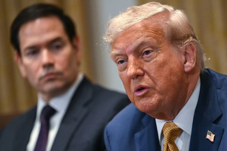 لماذا أقالت الخارجية الأميركية أكثر من 1300 موظف؟ 4 TOPSHOT - US President Donald Trump speaks as Secretary of State Marco Rubio (L) looks on during a cabinet meeting in the Cabinet Room of the White House in Washington, DC, on July 8, 2025. (Photo by ANDREW CABALLERO-REYNOLDS / AFP)