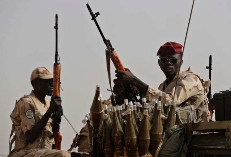 تشهد معارك شرسة.. ما الأهمية الإستراتيجية لمدينة بابنوسة بكردفان؟ 1 FILE - Sudanese soldiers from the Rapid Support Forces unit, led by Gen. Mohammed Hamdan Dagalo, the deputy head of the military council, secure the area where Dagalo attends a military-backed tribe's rally, in the East Nile province, Sudan, on June 22, 2019. The U.N. Security Council adopted a resolution Thursday, June 13, 2024, demanding that Sudan’s paramilitary force halt its siege of the only capital in the vast western region of Darfur that it doesn’t control where more than a million people are reportedly trapped. The resolution, which was approved by a vote of 14-0 with Russia abstaining, expresses “grave concern” at the spreading violence and credible reports that the paramilitary Rapid Support Forces are carrying out “ethnically motivated violence” in El Fasher. (AP Photo/Hussein Malla, File)