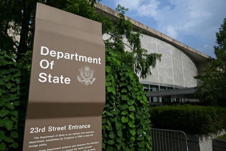 لماذا أقالت الخارجية الأميركية أكثر من 1300 موظف؟ 3 A sign is seen outside the US State Department in Washington, DC, on July 11, 2025. The US State Department began laying off more than 1,300 employees as part of President Donald Trump's campaign to massively downsize the federal government workforce. A State Department official said 1,107 members of the civil service and 246 Foreign Service employees were being informed that they were being fired. (Photo by SAUL LOEB / AFP)