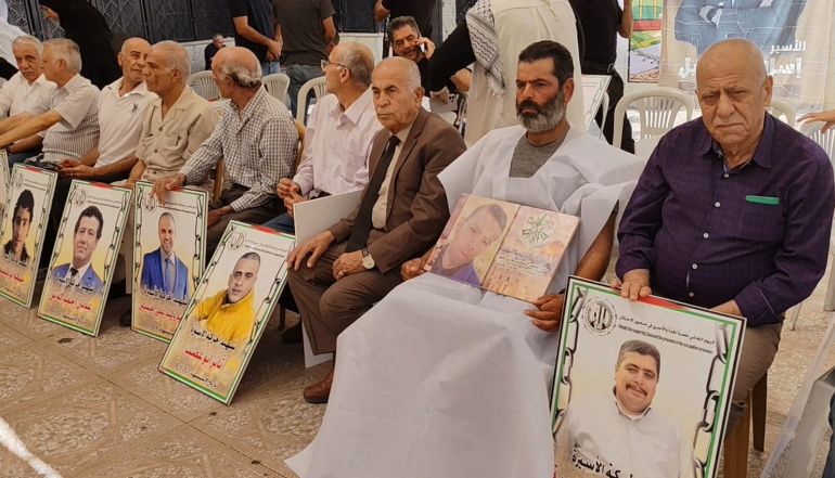 في اليوم الوطني لاستردادها.. ما مصير آلاف جثامين الشهداء الفلسطينيين؟ 1 فلسطين- عزيزة نوفل- رام الله- اعتصام للمطالبة بتسليم جثامين الشهداء - الجزيرة نت (1)