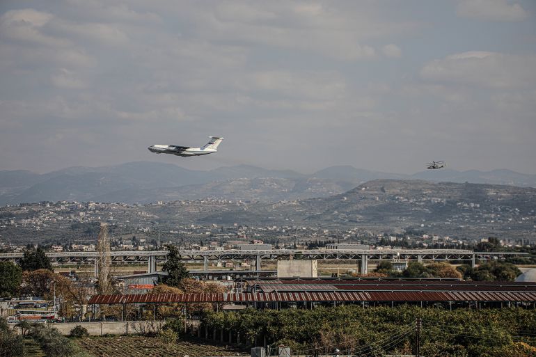 ما الذي يعيد جمع دمشق وموسكو على الطاولة؟ 2 LATAKIA, SYRIA - DECEMBER 15: Military vehicles such as helicopters and planes along with surveillance balloons, belonging to the Russian troops, are seen entering the Russian Khmeimim Air Base in Jabla in Latakia, Syria on December 15, 2024. With the Baath regime's collapse, Russia continued to transfer its troops from Damascus, Homs and other cities across Syria to the base. (Photo by Izzettin Kasim/Anadolu via Getty Images)