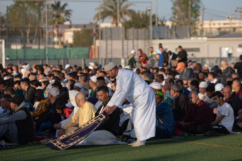 CARTAGENA, SPAIN- APRIL 21: Muslims gather to perform prayer of Eid al-Fitr that marks end of the fasting month of Ramadan, one of the holiest months in the Islamic calendar, in Torre-Pacheco, Cartagena, Spain on April 21, 2023. (Photo by Loyola Perez De Villegas Muniz/Anadolu Agency via Getty Images)