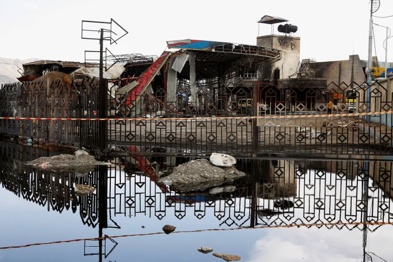 خبير يمني للجزيرة نت: إسرائيل عاجزة عن استهداف قادة الحوثيين 2 A destroyed fuel station is reflected in a pool of water one day after Israeli airstrikes hit the station in Sanaa, Yemen, August 25, 2025. REUTERS/Stringer