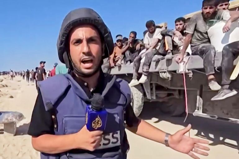 This undated recent image, taken from video broadcast by the Qatari-based television station Al Jazeera, shows the network's Arabic-language Gaza correspondent, Anas al-Sharif, reporting on camera in Gaza. Al-Sharif and four other Al Jazeera staff members were killed by an Israeli drone strike on their tent in Gaza City shortly before midnight on Sunday. (Al Jazeera via AP)