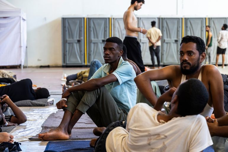 Refugees and migrants are at the temporary hosting facility of Agia, an expo pavilion, outside the city of Chania on Crete island. The newcomers are asylum seekers mostly from African countries and travel on boats from Libya to Greece, crossing the Mediterranean Sea. The Greek government and lawmakers try to revoke the asylum applications and imprison the newly arrived people in detention camps in Chania, Greece, on July 14, 2025. (Photo by Gene Medi/NurPhoto via Getty Images)