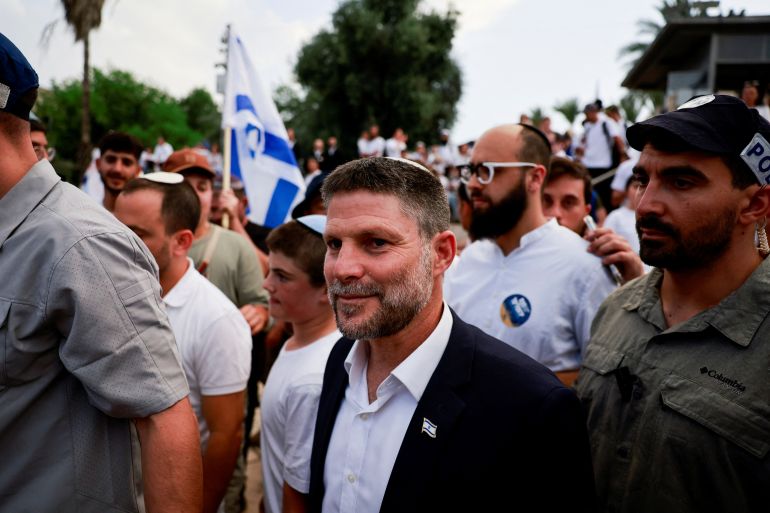 شريطا الأسيرين الجائعين يربكان إسرائيل ويسعران سجالاتها 1 Israeli Finance Minister Bezalel Smotrich walks to visit the Damascus Gate to Jerusalem's Old City, as Israelis mark Jerusalem Day, in Jerusalem May 26, 2025. REUTERS/Ammar Awad