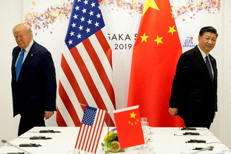 هل يعيد ترامب رسم خرائط النفوذ بالكونغو عبر بوابة المعادن؟ 2 FILE PHOTO: FILE PHOTO: U.S. President Donald Trump attends a bilateral meeting with China's President Xi Jinping during the G20 leaders summit in Osaka, Japan, June 29, 2019. REUTERS/Kevin Lamarque/File Photo/File Photo