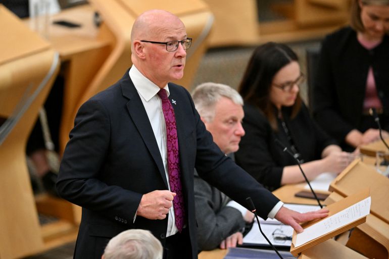 حكومة ستارمر تحت الضغط بين استقبال هرتسوغ والاعتراف بفلسطين 1 Scotland's First Minister John Swinney delivers a speech calling on the Scottish Parliament to recognise the State of Palestine, at the Scottish Government Buildings in Edinburgh, Scotland on September 3, 2025. (Photo by ANDY BUCHANAN / AFP)