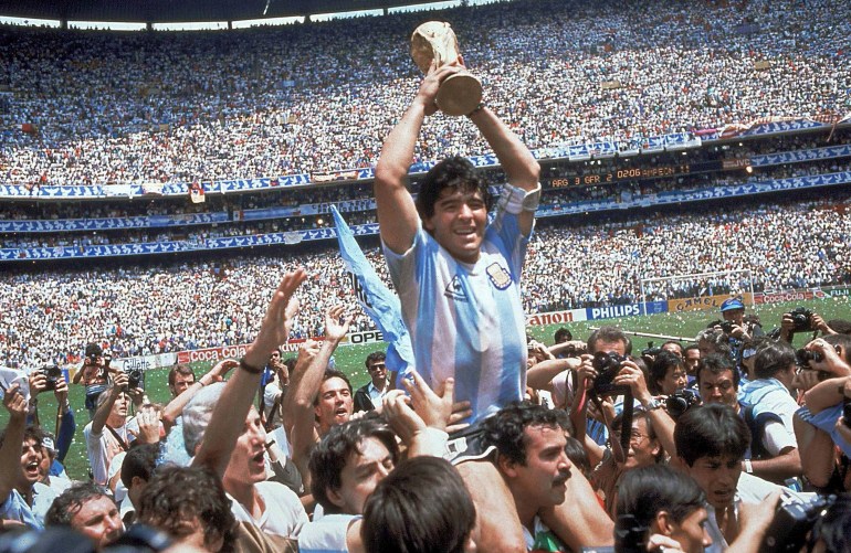 FILE - Argentina's Diego Maradona, celebrates at the end of the World Cup soccer final game against West Germany at the Atzeca Stadium, in Mexico City, June 29, 1986. The heirs of the late soccer star Diego Maradona have won a legal battle over the use of his trademark. Maradona had registered his name as a trademark with the European Union Intellectual Property Office in 2008 for a variety of products, clothing, footwear and headgear. The general court of the European Union confirmed Tuesday that it declined to transfer the trademark to Sattvica, an Argentine company belonging to Maradona’s former lawyer. Maradona died in November 2020. (AP Photo/Carlo Fumagalli, File)