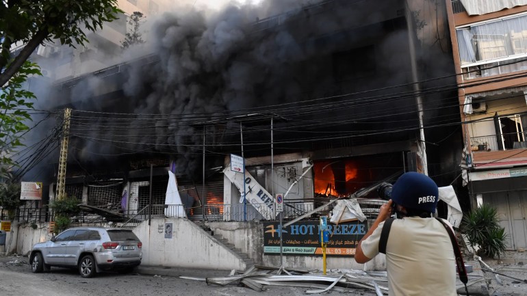 Smoke and flames rise after an Israeli air strike on Dahiyeh, Beirut, on October 6, 2024 [Houssam Shbaro/Anadolu Agency ]