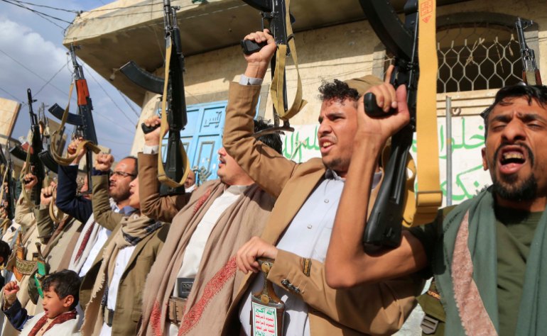 Houthi supporters demonstrate against the US and Israel