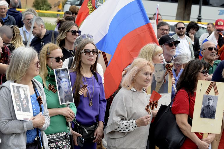 بالصور.. روسيا وأوروبا تحييان ذكرى الانتصار على النازية 30 ROME, ITALY - MAY 4: Russian people and sympathizers gather in Piazza Ugo La Malfa to celebrate the Immortal Regiment on the anniversary of the Soviet victory over Nazi Germany with photos of the fighters, Soviet banners and St George's ribbon on May 4, 2025 in Rome, Italy. The event, which started in Russia on the fringes of Victory Day (on May 9), celebrates Russia's defeat of Nazism and aims to "immortalize" the memory of World War II veterans. (Photo by Simona Granati - Corbis/Corbis via Getty Images)