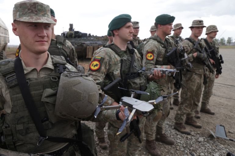 أوروبا تخوض سباق حواجز لإعادة التسلح 21 PABRADE, LITHUANIA - MAY 29: Lithuanian troops stand with their DJI drones at the Quadriga military exercises involving German, French, Dutch and Lithuanian troops during a Distinguished Visitors' Day on May 29, 2024 near Pabrade, Lithuania. Quadriga is the final part of Steadfast Defender, a series of military exercises of the NATO alliance that has been taking place mostly in northern and eastern Europe and has involved 90,000 troops with thousands of vehicles. (Photo by Sean Gallup/Getty Images)