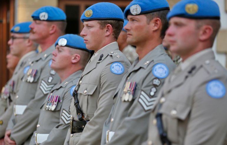 بريطانيا توسع نفوذها في أفريقيا تحت غطاء الأمن 23 NICOSIA, CYPRUS - SEPTEMBER 18: Members of the British Royal Engineers serving in the United Nations Peace Keeping Force in Cyprus (UNFICYP) attend a thanksgiving service for the late Queen Elizabeth II, at St. Paul's Anglican Cathedral, on September 18, 2022 in Nicosia, Cyprus. Queen Elizabeth II died at Balmoral Castle in Scotland on September 8, 2022, and is succeeded by her eldest son, King Charles III. (Photo by Alexis Mitas/Getty Images)