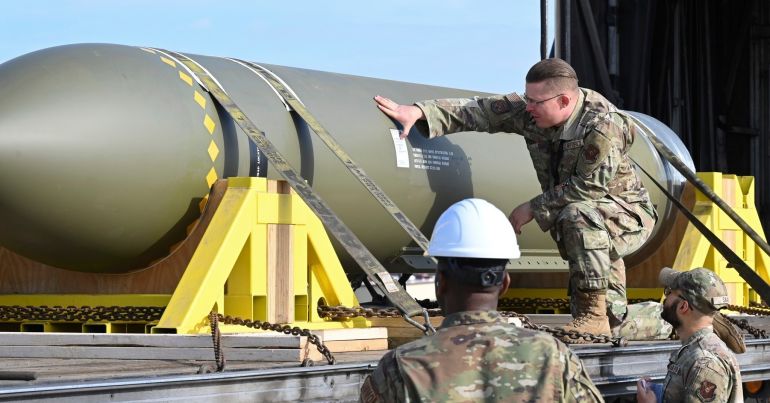 هل تصمد منشأة فوردو الإيرانية أمام "الذخيرة الخارقة"؟ 1 In this photo released by the U.S. Air Force on May 2, 2023, airmen look at a GBU-57, or the Massive Ordnance Penetrator bomb, at Whiteman Air Base in Missouri. That U.S. bomb, designed to destroy underground sites at the height of concerns a decade ago over Iran's nuclear program, has briefly reappeared amid new tensions with the Islamic Republic. (U.S. Air Force via AP)