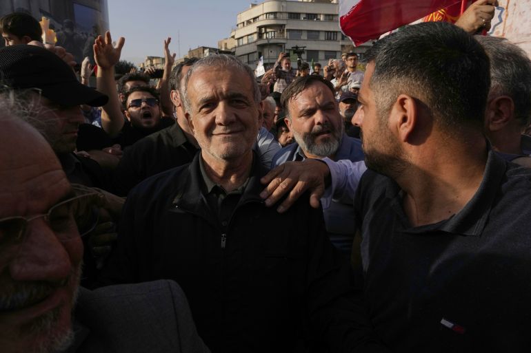 هل انتهت حرب الـ12 يوما بين إسرائيل وإيران؟ وما مكاسب كل طرف؟ 2 Iranian President Masoud Pezeshkian attends a protest following the U.S. attacks on nuclear sites in Iran, in Tehran, Iran, Sunday, June 22, 2025. (AP Photo/Vahid Salemi)