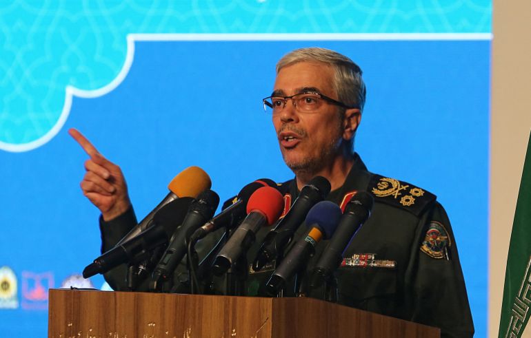 أبرز القادة والعلماء الإيرانيين الذين استهدفهم الهجوم الإسرائيلي 1 (FILES) Iranian Armed Forces Chief of Staff Major General Mohammad Bagheri speaks during the the International Conference on the Legal-International Claims of the Holy Defense in the capital Tehran on February 23, 2021.