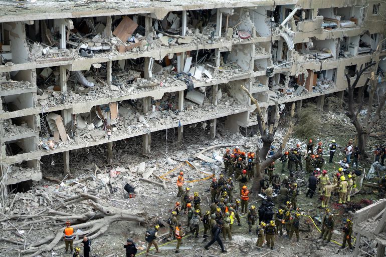 كلفة حرب إسرائيل وإيران وخسائرها.. مبان قيد الهدم وتعويضات بالمليارات 2 TEL AVIV, ISRAEL - JUNE 22: Emergency workers respond to the site of a missile strike in the Ramat Aviv neighborhood of Tel Aviv on June 22, 2025 in Tel Aviv, Israel. Israel was hit with a fresh wave of aerial attacks by Iran after the US entered the war overnight and bombed several Iranian nuclear sites. (Photo by Erik Marmor/Getty Images)