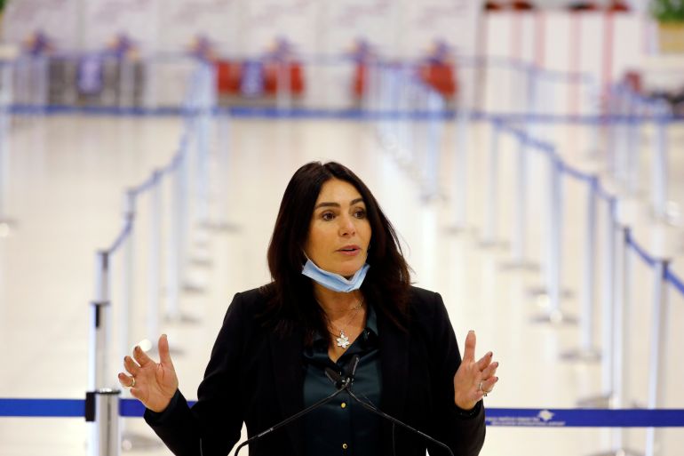 الفرار من حيفا وتل أبيب: الهجرة العكسية تُربك الدولة العِبرية 2 Israeli Transportation Minister Miri Regev speaks during a presentation as Ben Gurion international airport introduced a rapid coronavirus disease (COVID-19) testing system in an effort to restore commercial aviation and facilitate "clean flights" for passengers who either show proof of immunity or test negative near Tel Aviv, in Lod, Israel March 8, 2021. REUTERS/Amir Cohen