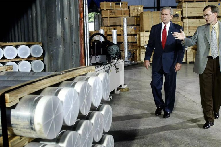 President George W. Bush receives a tour of nuclear material surrendered by Libya and flown to the Oak Ridge National Laboratory, a U.S. facility in Oak Ridge, Tenn., in 2004.