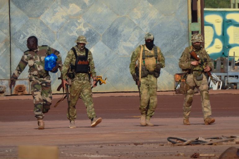 التطهير الروسي.. كيف تغير بوتين بعد تمرد فاغنر؟ 2 FILE - This undated photograph handed out by French military shows three Russian mercenaries, right, in northern Mali. Russia's Wagner Group, a private military company led by Yevgeny Prigozhin, a rogue millionaire with longtime links to Russia's President Vladimir Putin, has played a key role in the fighting in Ukraine and also deployed its personnel to Syria, Central African Republic, Libya and Mali. (French Army via AP, File)