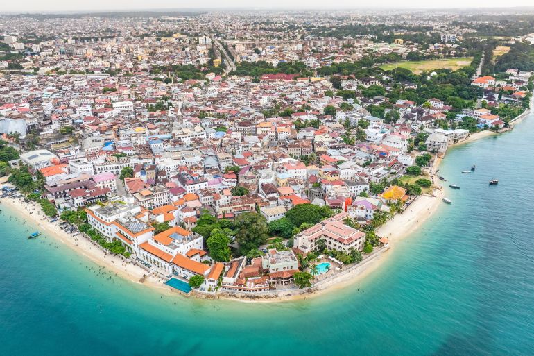 مصريون يجدون "وطنا ثانيا" في تنزانيا بعد الهجرة جنوبا 6 Aerial city view of area around the historic Stone Town, the oldest part of Zanzibar Town on Unjuja island, Tanzania with historic buildings and beaches ; Shutterstock ID 2432295431; purchase_order: aljazeera ; job: ; client: ; other: