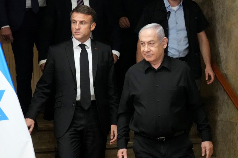 لماذا اعترف ماكرون بفلسطين الآن؟ 1 Israeli Prime Minister Benjamin Netanyahu and French President Emmanuel Macron hold a joint press conference, amid the Israeli-Hamas conflict, in Jerusalem, October 24, 2023. Christophe Ena/Pool via REUTERS
