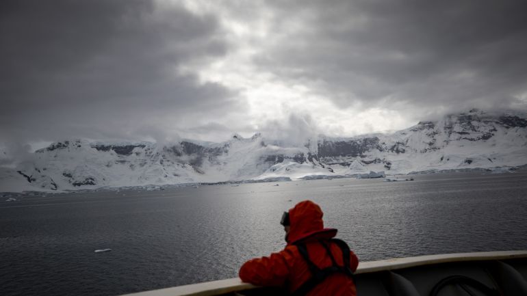 مستشفى المجانين في نهاية الأرض.. ماذا يفعل الشتاء القطبي بعقول البشر؟ 4 Race for research at continent of science and peace Antarctica- - ANTARCTICA - FEBRUARY 08 : Assistant Prof. Dr. Burak Karacik, Istanbul Technical University - Faculty of Naval Architecture and Ocean Engineering, watches the view from deck as they pass through the Lemaire Channel, Antarctica, Polar Regions on February 08, 2019. Turkish scientific research team began their journey within the 3rd National Science Antarctica Expedition, under the auspices of Presidency of