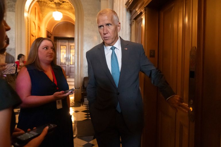 كيف أنقذ الجمهوريون بمجلس الشيوخ قانون "ترامب الكبير"؟ 1 Sen. Thomas Tillis, R-N.C., speaks to reporters as Republicans begin a final push to advance President Donald Trump's tax breaks and spending cuts package, at the Capitol in Washington, Monday, June 30, 2025. (AP Photo/Mark Schiefelbein)
