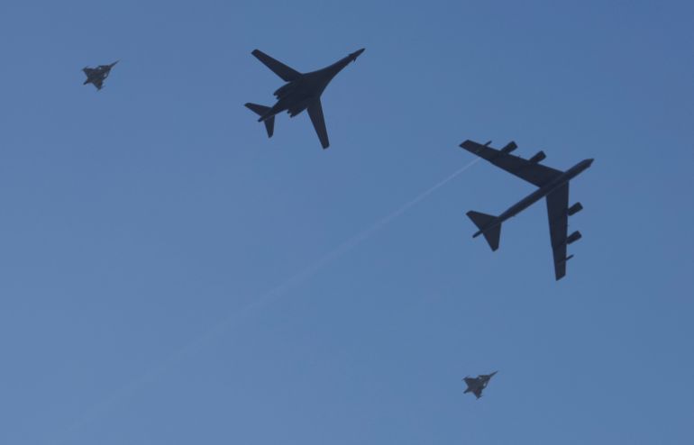 جيش الفايكينغ المُخيف يعود بأكثر من 200 مليار يورو 4 A B-1B Lancer and a B-52 Stratofortress, escorted by Swedish Jas 39 Gripen, pass over Stockholm, Sweden, as the Swedish Armed Forces conduct a joint exercise with the U.S. Bomber Task Force, March 6, 2024. REUTERS/Leonhard Foeger