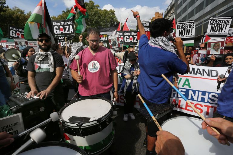 أبرز الصور في أسبوع.. تواصل الفظائع بغزة وكوارث طبيعية بأفغانستان 5 LONDON, ENGLAND - SEPTEMBER 06: Protesters march to the beat of a drum during the demonstration on September 6, 2025 in London, England. The National March for Palestine 'Stop Starving Gaza' is the 30th march since the war began in October 2023 and comes ahead of Israel's president Herzog visit to the UK next week. (Photo by Martin Pope/Getty Images)